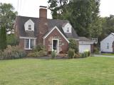 Cape cod-style house with central air condition un